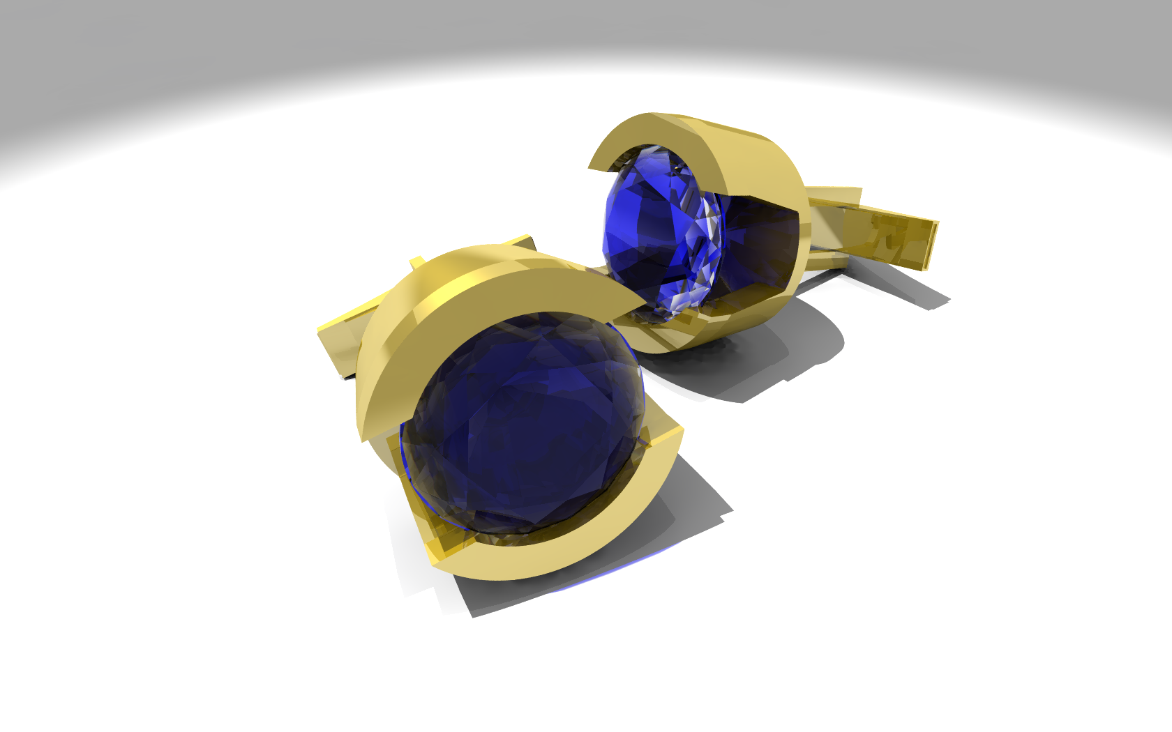 18kt yellow gold cufflinks set with Montana Sapphires.